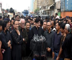 Murad leads Ashura procession, highlights Muharram security, Lyari building collapse, response
